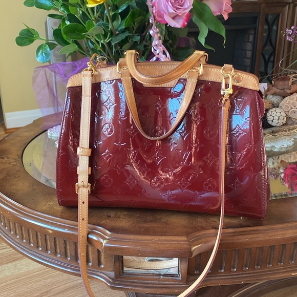 Christian Louboutin Handbags - LV bag color  wine Good condition!